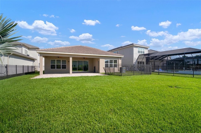 3326 Acacia Bay Ave, Wesley Chapel, FL 33543 - rear view of property with a ceiling fan, a fenced backyard, stucco siding, and a patio area