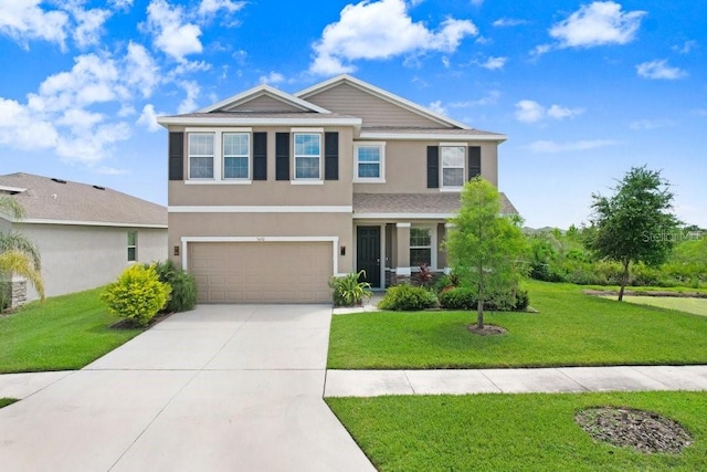 5430 Thistle Field Ct, Wesley Chapel, FL 33545 - view of front of home featuring stucco siding, a garage, driveway, and a front yard