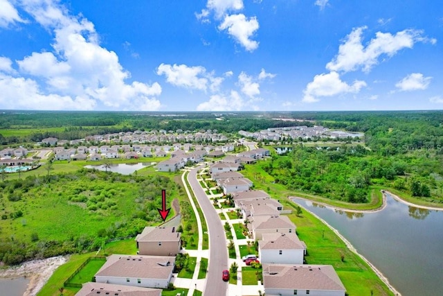 5430 Thistle Field Ct, Wesley Chapel, FL 33545 - aerial view of residential area featuring a large body of water and a heavily wooded area