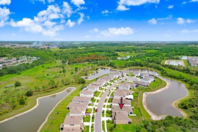 5430 Thistle Field Ct, Wesley Chapel, FL 33545 - aerial perspective of suburban area with a heavily wooded area and a large body of water