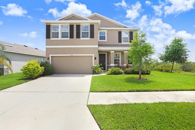 5430 Thistle Field Ct, Wesley Chapel, FL 33545 - view of front of house featuring stucco siding, an attached garage, concrete driveway, and a front lawn