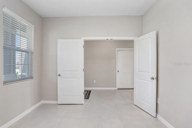 5430 Thistle Field Ct, Wesley Chapel, FL 33545 - unfurnished bedroom with baseboards