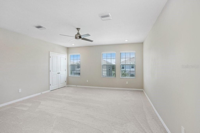 5430 Thistle Field Ct, Wesley Chapel, FL 33545 - spare room with ceiling fan, light colored carpet, and recessed lighting