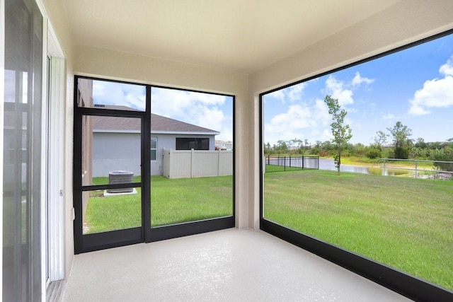5430 Thistle Field Ct, Wesley Chapel, FL 33545 - unfurnished sunroom with a water view