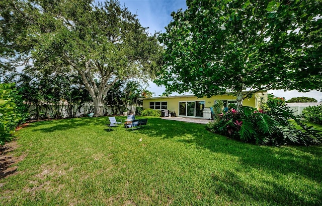 14534 Yacht Club Blvd, Seminole, FL 33776 - fenced backyard featuring a patio area