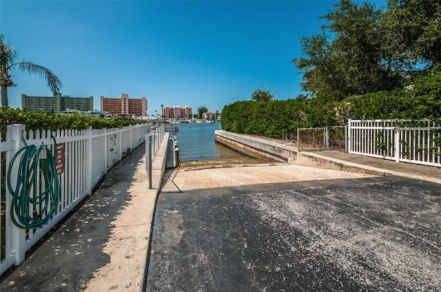 14534 Yacht Club Blvd, Seminole, FL 33776 - dock featuring a boat ramp and a water view