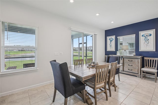 10580 Gliding Eagle Way, Land O Lakes, FL 34638 - dining space with light tile patterned floors and recessed lighting