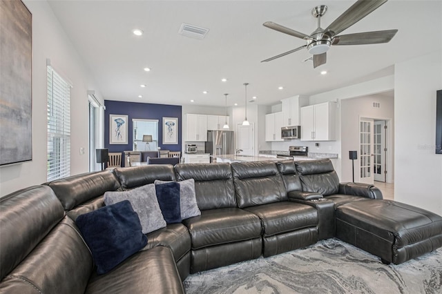 10580 Gliding Eagle Way, Land O Lakes, FL 34638 - living area featuring ceiling fan and recessed lighting