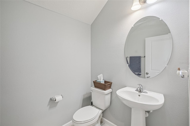 10580 Gliding Eagle Way, Land O Lakes, FL 34638 - half bath featuring toilet and vaulted ceiling