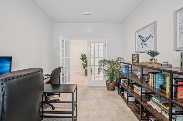 10580 Gliding Eagle Way, Land O Lakes, FL 34638 - office area with french doors and light tile patterned flooring