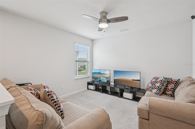 10580 Gliding Eagle Way, Land O Lakes, FL 34638 - carpeted living room featuring ceiling fan and baseboards