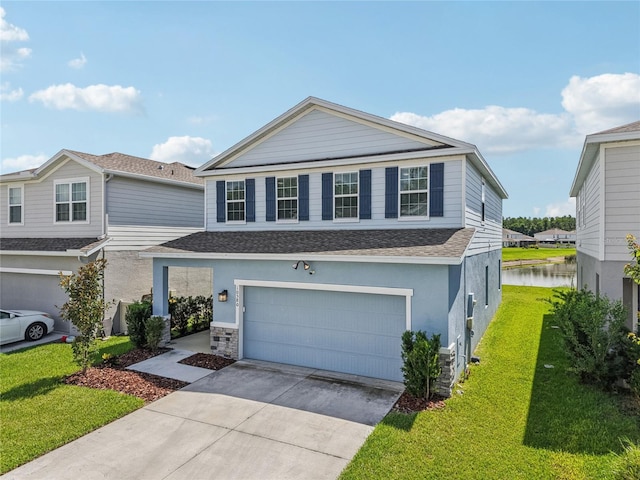 10580 Gliding Eagle Way, Land O Lakes, FL 34638 - view of front of home featuring an attached garage, a front lawn, roof with shingles, and concrete driveway