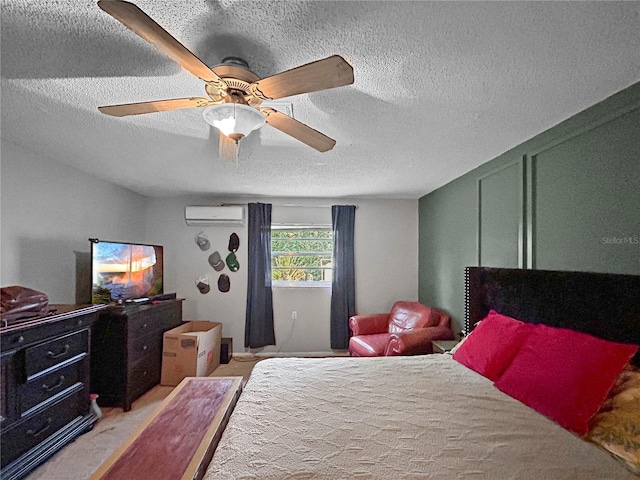 1609 Haven Bnd, Tampa, FL 33613 - bedroom with a wall mounted AC, a textured ceiling, ceiling fan, and carpet flooring