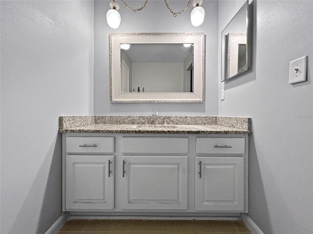 1609 Haven Bnd, Tampa, FL 33613 - bathroom with vanity and baseboards