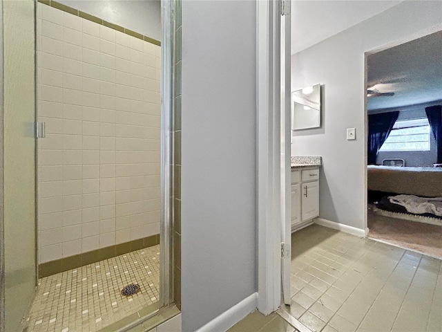 1609 Haven Bnd, Tampa, FL 33613 - full bathroom featuring ensuite bath, a shower stall, vanity, and tile patterned flooring