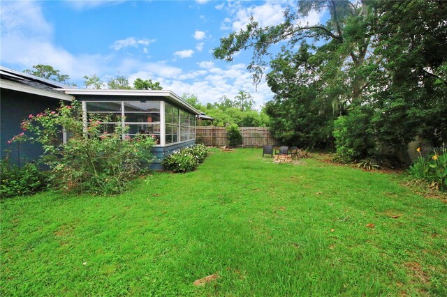 1609 Haven Bnd, Tampa, FL 33613 - view of yard featuring a sunroom