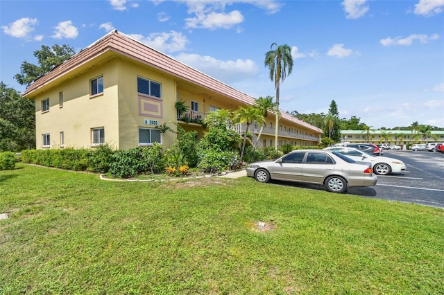 2003 Greenbriar Blvd Unit 8, Clearwater, FL 33763 - view of property with uncovered parking