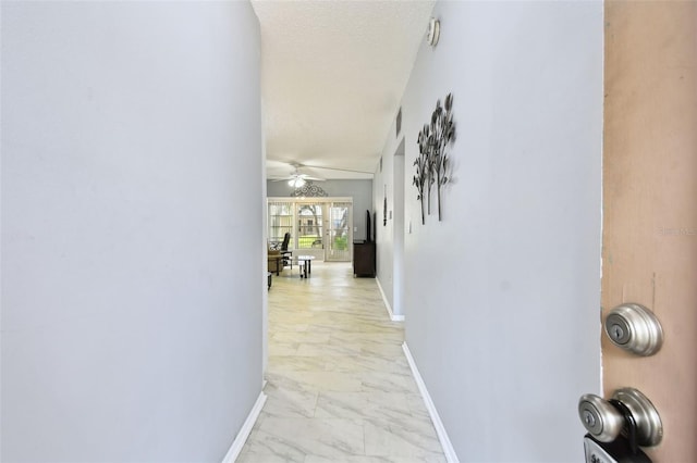 2003 Greenbriar Blvd Unit 8, Clearwater, FL 33763 - hall featuring light marble finish floors and baseboards