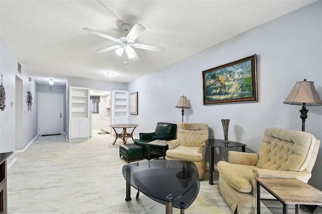 2003 Greenbriar Blvd Unit 8, Clearwater, FL 33763 - sitting room featuring a ceiling fan, a textured ceiling, and light marble finish flooring