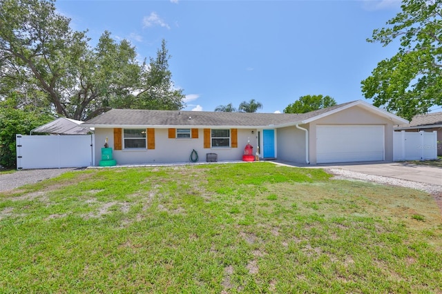 540 Firefly Ln, Apollo Beach, FL 33572 - ranch-style house featuring concrete driveway, stucco siding, and a garage