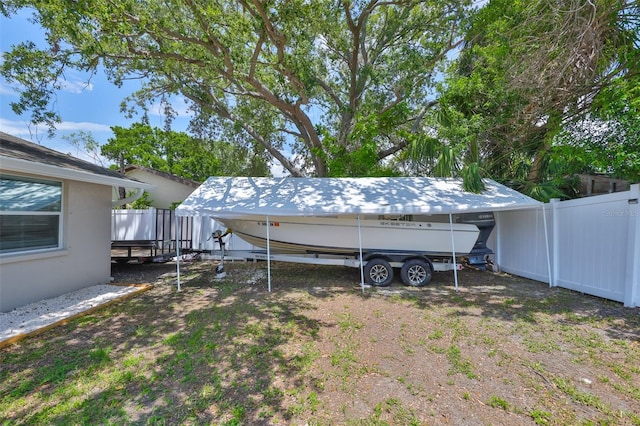 540 Firefly Ln, Apollo Beach, FL 33572 - view of yard featuring a carport
