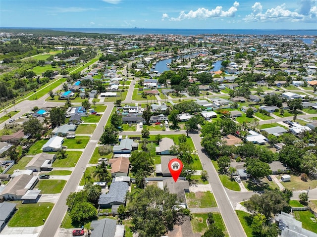 540 Firefly Ln, Apollo Beach, FL 33572 - aerial overview of property's location featuring a large body of water and nearby suburban area