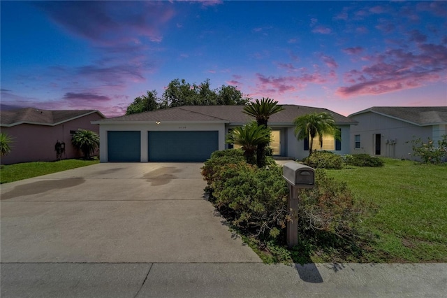 2719 Wilder Trace Ct, Plant City, FL 33566 - single story home with concrete driveway, a garage, a front yard, and stucco siding