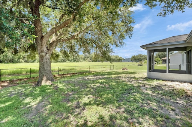 2719 Wilder Trace Ct, Plant City, FL 33566 - fenced backyard featuring a sunroom