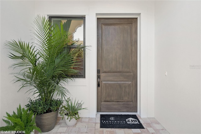 19781 Marino Lake Cir Unit 201, Miromar Lakes, FL 33913 - view of exterior entry with stucco siding