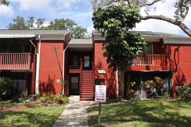 8220 12th Way N Unit H, Saint Petersburg, FL 33702 - view of building exterior with stairway