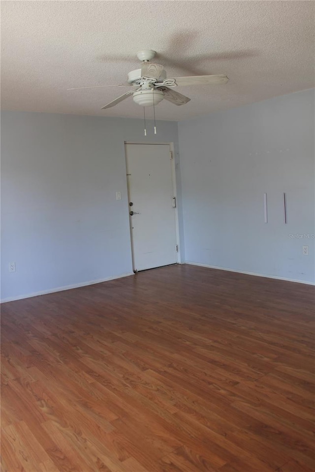 8220 12th Way N Unit H, Saint Petersburg, FL 33702 - empty room with wood finished floors, ceiling fan, and a textured ceiling