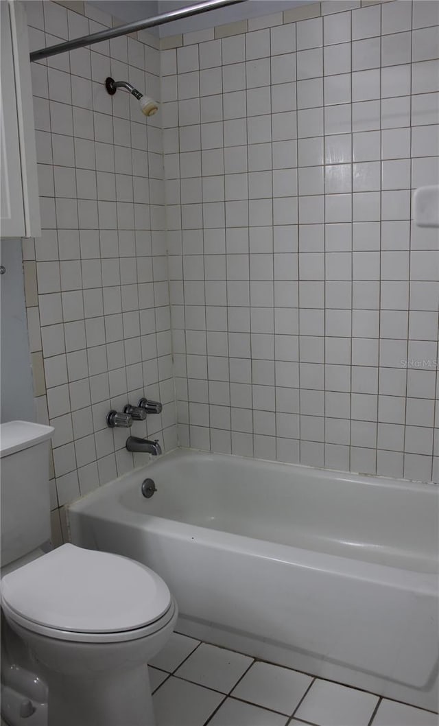 8220 12th Way N Unit H, Saint Petersburg, FL 33702 - bathroom with tile patterned flooring and  shower combination