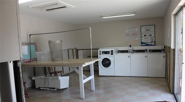 8220 12th Way N Unit H, Saint Petersburg, FL 33702 - shared laundry with light flooring and washing machine and dryer
