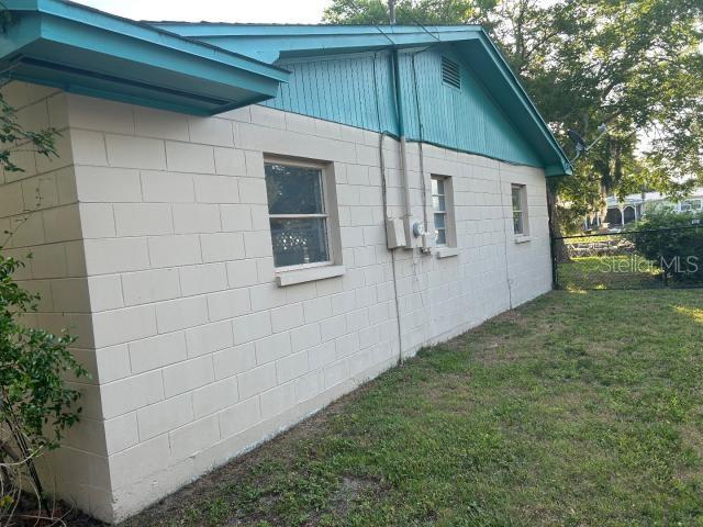 3901 N Nokomis Pt, Crystal River, FL 34428 - view of side of property featuring concrete block siding