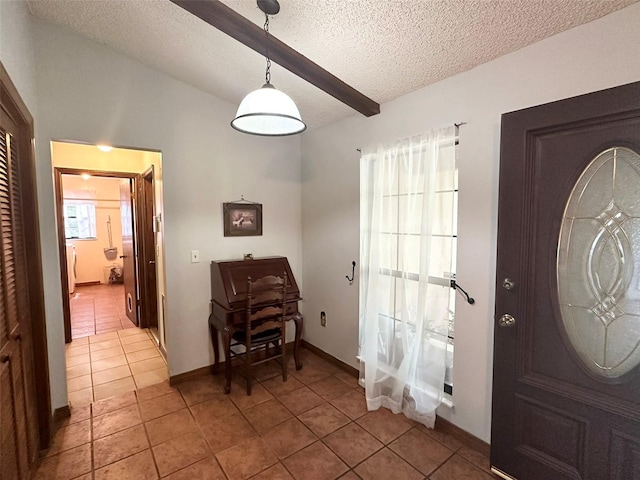 6262 E Rector St, Inverness, FL 34452 - foyer entrance featuring a textured ceiling, light tile patterned floors, and lofted ceiling