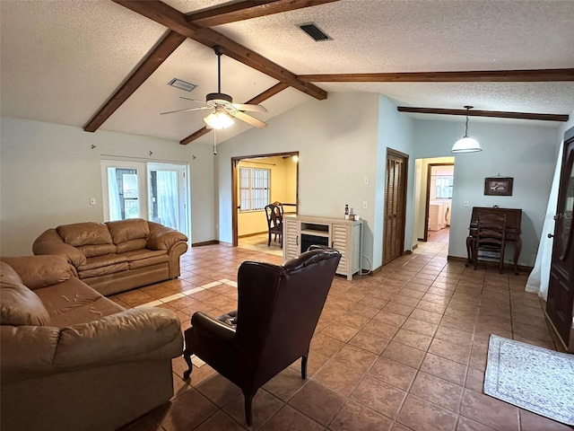 6262 E Rector St, Inverness, FL 34452 - tiled living room with a textured ceiling and ceiling fan
