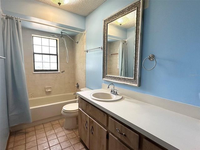 6262 E Rector St, Inverness, FL 34452 - bathroom featuring vanity, shower / bath combo with shower curtain, a textured ceiling, and tile patterned flooring