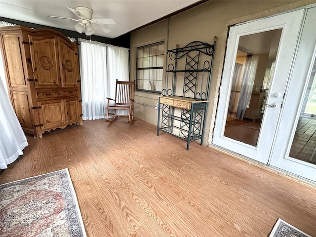 6262 E Rector St, Inverness, FL 34452 - living area with ceiling fan and wood finished floors