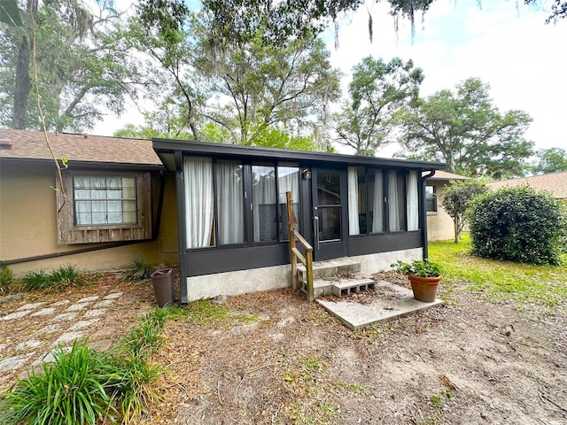 6262 E Rector St, Inverness, FL 34452 - view of front of property with a sunroom