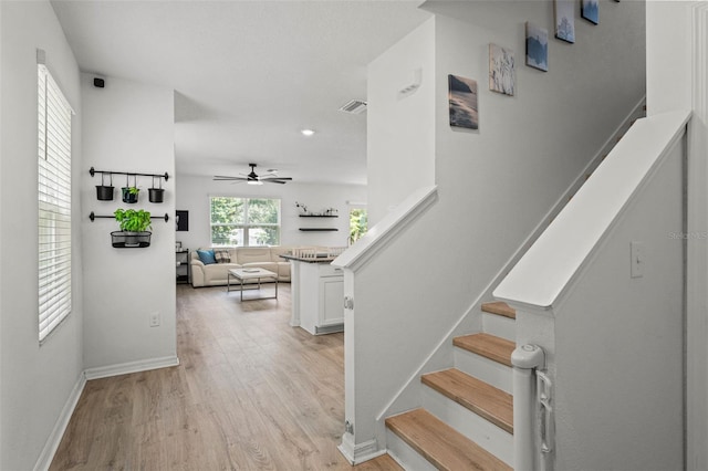 10823 Trailing Vine Dr, Tampa, FL 33610 - staircase featuring wood finished floors, a ceiling fan, and recessed lighting