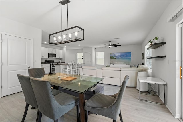 10823 Trailing Vine Dr, Tampa, FL 33610 - dining space featuring light wood-style floors, a ceiling fan, and recessed lighting
