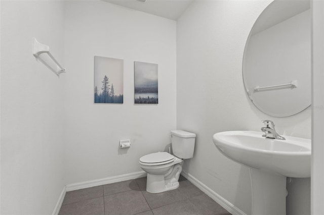 10823 Trailing Vine Dr, Tampa, FL 33610 - half bath featuring toilet and tile patterned floors