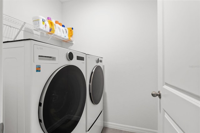 10823 Trailing Vine Dr, Tampa, FL 33610 - laundry room with washing machine and clothes dryer