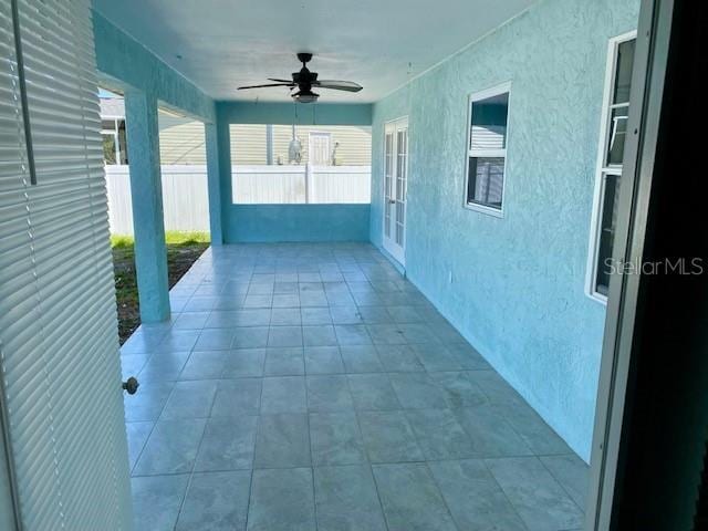 7322 Ellis Ln, Port Charlotte, FL 33981 - view of patio / terrace featuring a ceiling fan and french doors