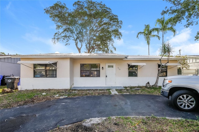 310 SW 76th Ter, North Lauderdale, FL 33068 - view of front of house with brick siding and stucco siding