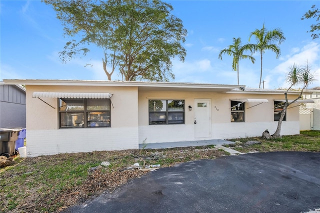 310 SW 76th Ter, North Lauderdale, FL 33068 - view of front of house with brick siding and stucco siding