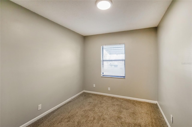 310 SW 76th Ter, North Lauderdale, FL 33068 - carpeted spare room featuring baseboards