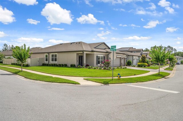 20108 Stone Pine Cir, Lutz, FL 33558 - view of front facade with an attached garage, stucco siding, and concrete driveway