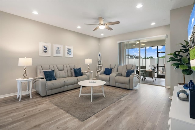 20108 Stone Pine Cir, Lutz, FL 33558 - living room featuring a ceiling fan, light wood-style floors, and recessed lighting