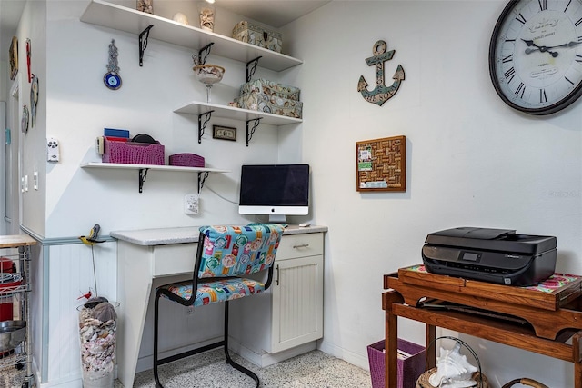 505 67th Ave Unit 11, St Pete Beach, FL 33706 - home office featuring dark aggregate flooring and baseboards